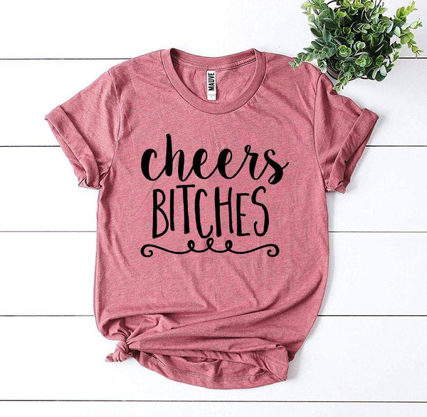 Bye Felicia Goods® “Cheers Bitches” T-Shirt – Party-Ready Graphic Tee